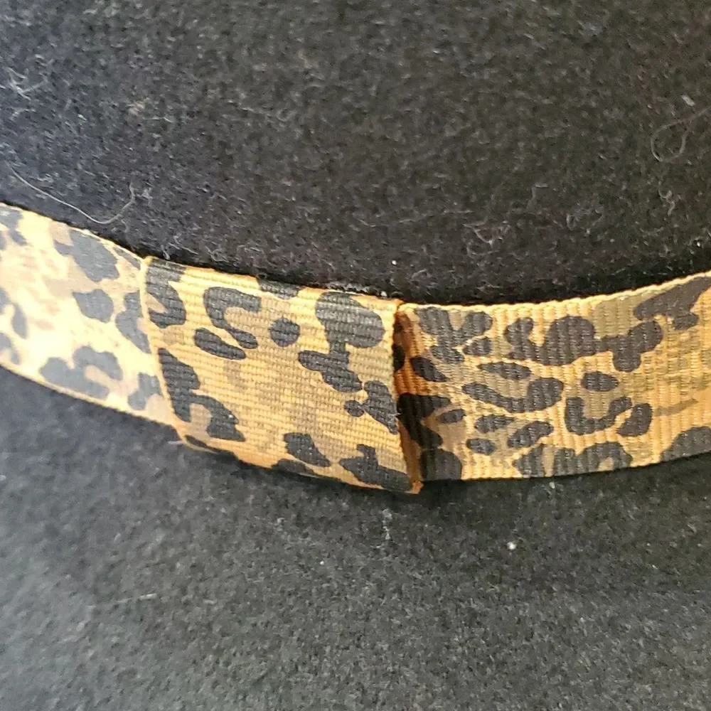 100% wool black hat with animal‎ print ribbon. 7